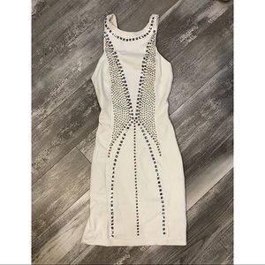 Fitted open back embellished white dress